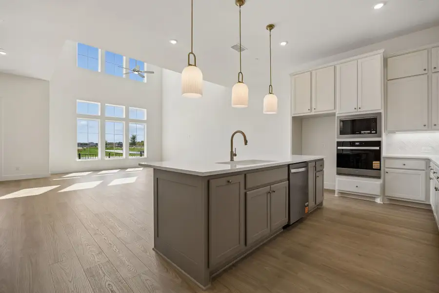 Furnished interior view inside a new home in Newman Village Townhomes, Frisco (Image 4).