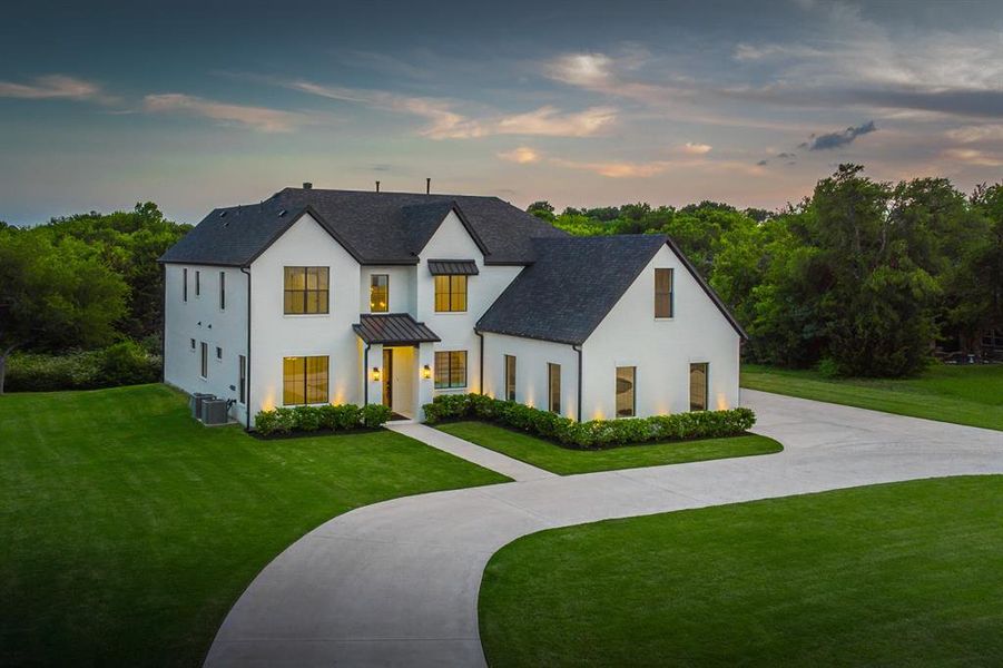 Front exterior of a new home in , McKinney, TX, highlighting curb appeal (Image 19).