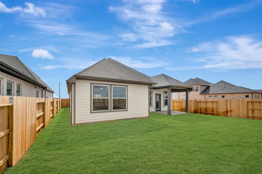 Exterior details and patio area of a home in The Grand Prairie 50’, Hockley (Image 3).