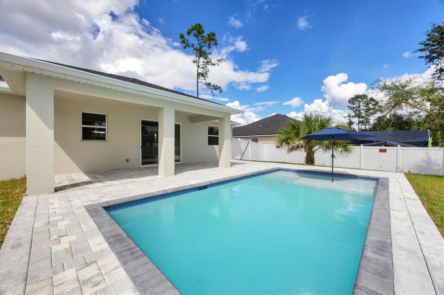 Exterior details and patio area of a home in , North Port (Image 25).