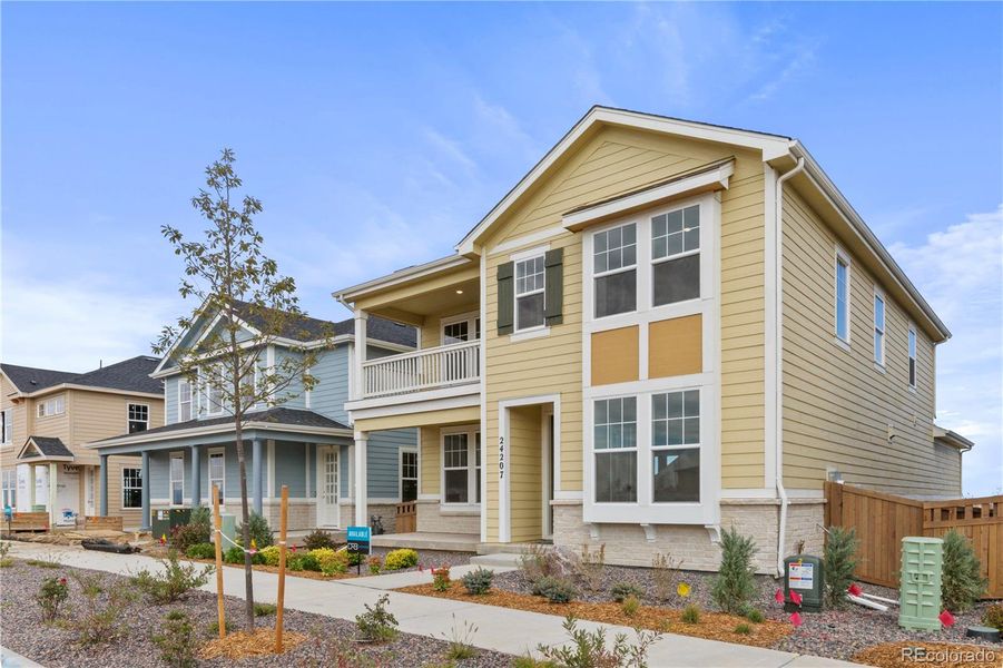 Front exterior of a new home in , Aurora, CO, highlighting curb appeal (Image 2). Front exterior of a new home in , Aurora, CO, highlighting curb appeal (Image 2).
