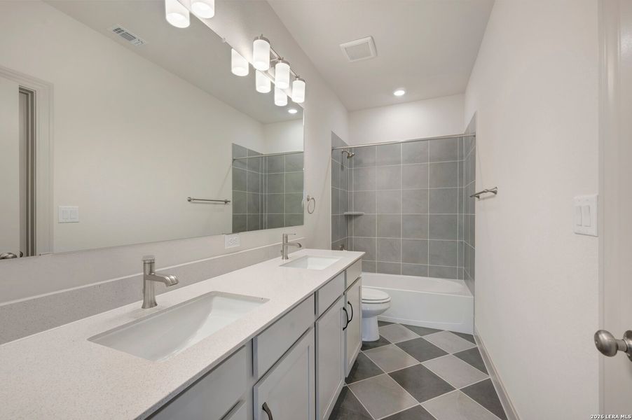 Furnished interior view inside a new home in Windsong - Legacy Series, Boerne (Image 14).