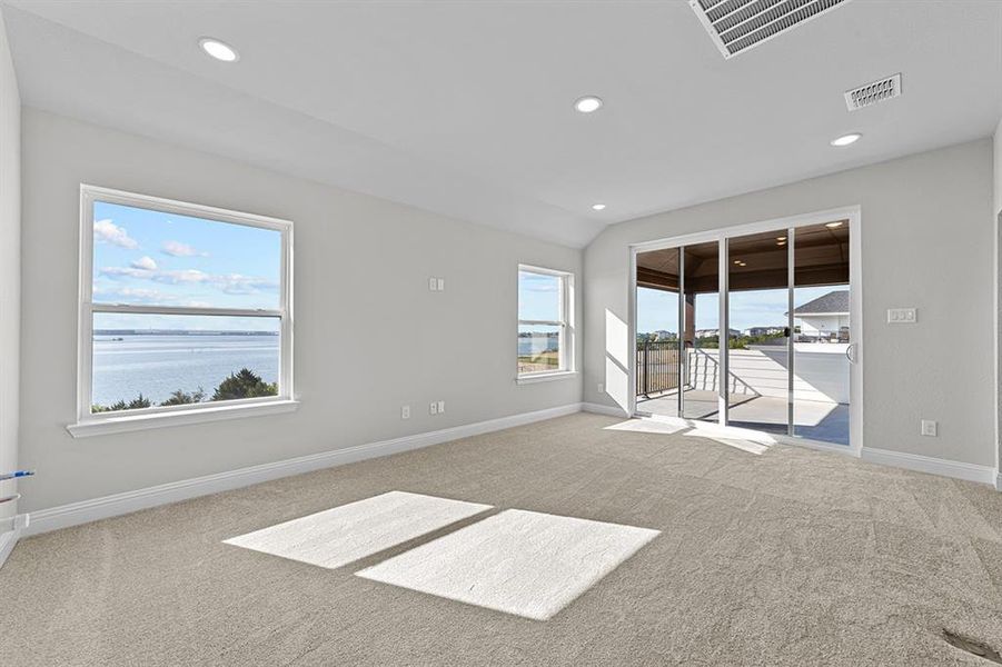 LOFT LOOKING OVER LAKE WITH PATIO ACCESS