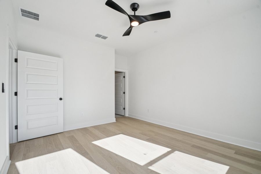 Spacious, unfurnished interior of a new home in Koenig Townhomes, Austin (Image 17).