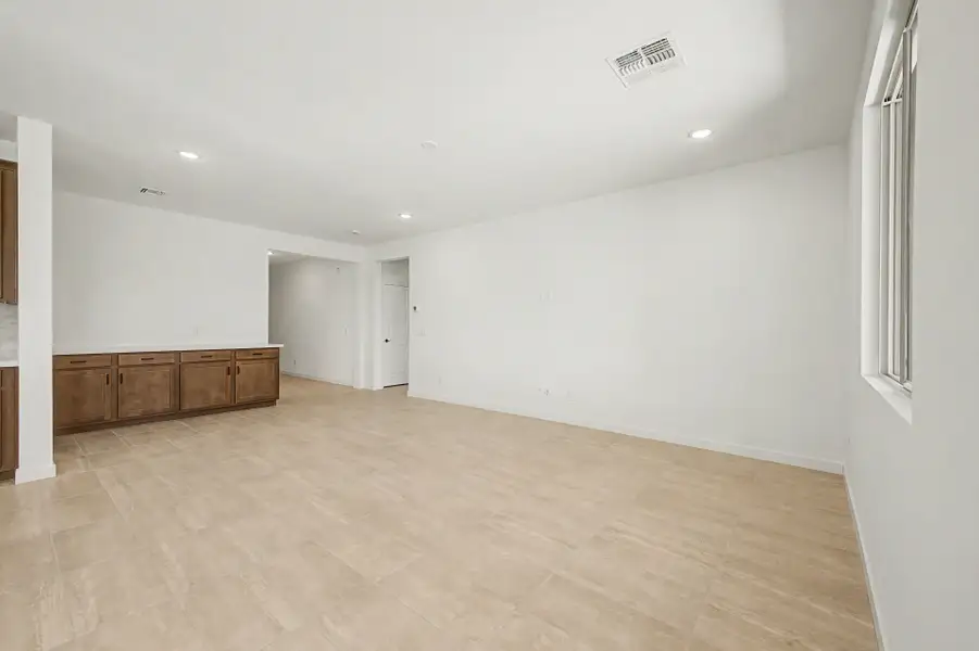 Spacious, unfurnished interior of a new home in The Villages at North Copper Canyon, Surprise (Image 7).