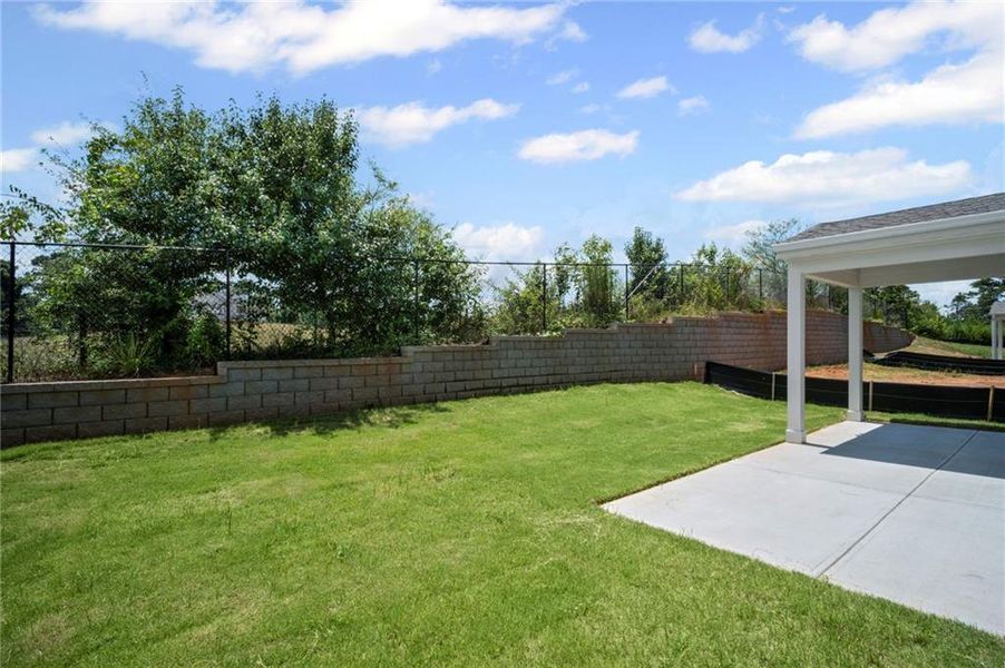 Front exterior of a new home in Laurel Farms, Dallas, GA, highlighting curb appeal (Image 24).