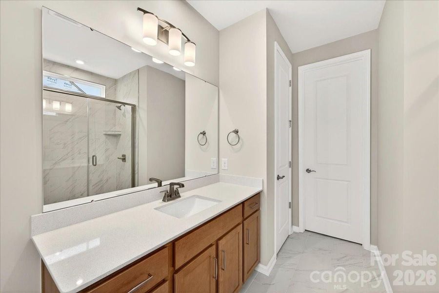 Brown cabinets and white quartz countertops Brown cabinets and white quartz countertops