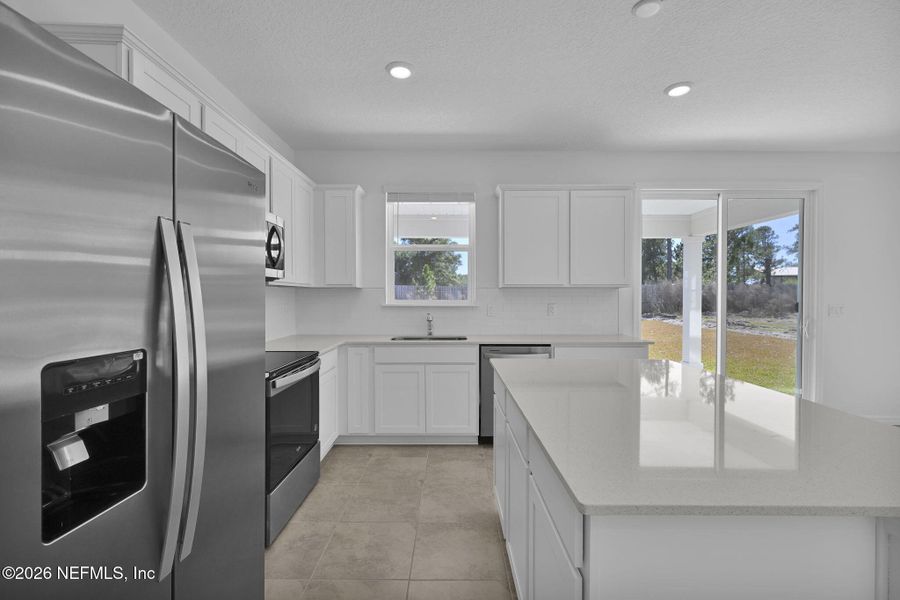 Furnished interior view inside a new home in Hyland Trail, Green Cove Springs (Image 7).