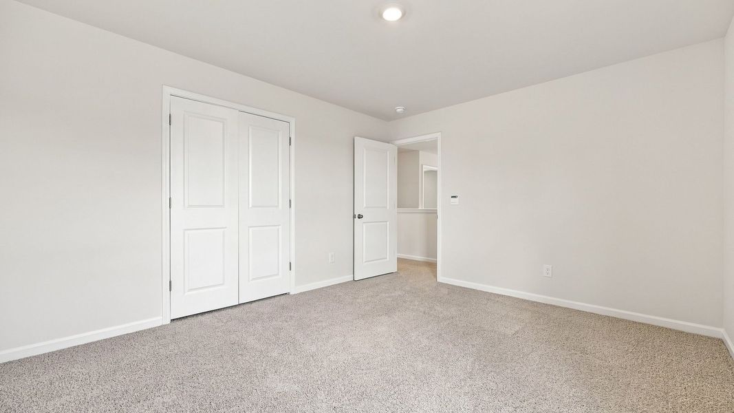 Spacious, unfurnished interior of a new home in Carter Ridge, Greenville (Image 31).