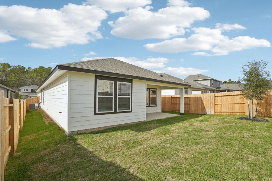 Exterior details and patio area of a home in Pine Lake Cove - Traditional Series, Montgomery (Image 22).