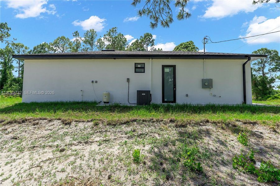 Exterior details and patio area of a home in , Lehigh Acres (Image 3).