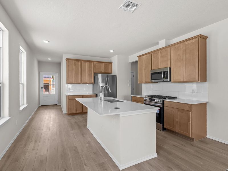 Furnished interior view inside a new home in Meadows at Oak Creek, San Antonio (Image 6).