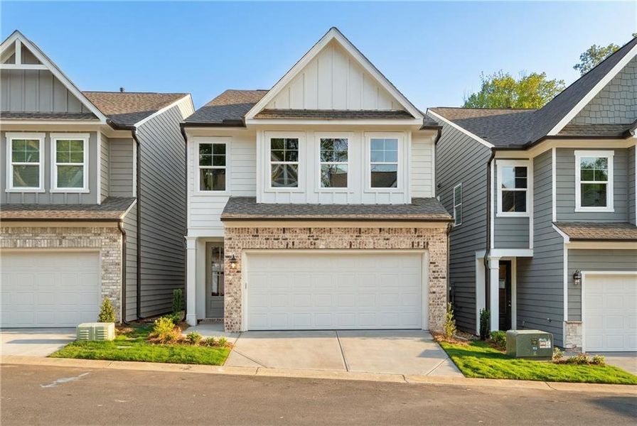 Front exterior of a new home in The Village at Shallowford, Kennesaw, GA, highlighting curb appeal (Image 1). Front exterior of a new home in The Village at Shallowford, Kennesaw, GA, highlighting curb appeal (Image 1).