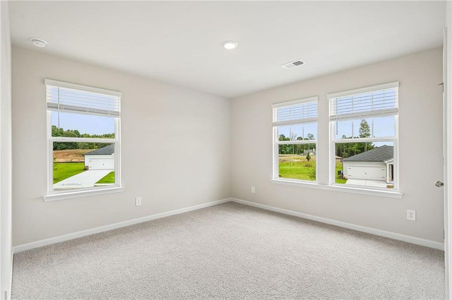 Spacious, unfurnished interior of a new home in Northwoods at Mirror Lake, Villa Rica (Image 40).