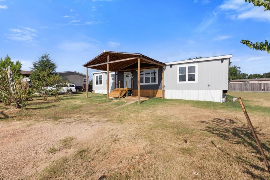 Exterior details and patio area of a home in , Conroe (Image 23).