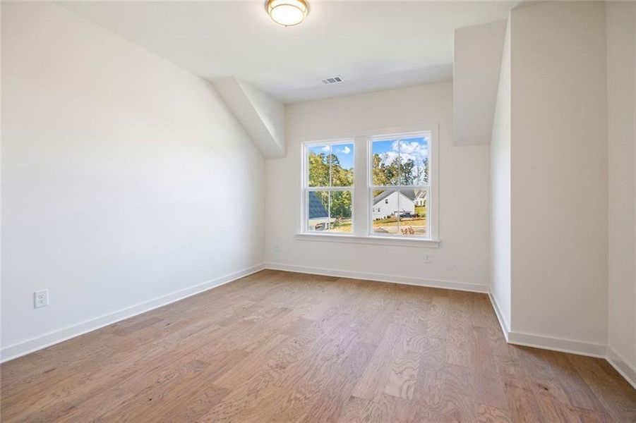 Spacious, unfurnished interior of a new home in Long Hollow Landing, Gainesville (Image 28).