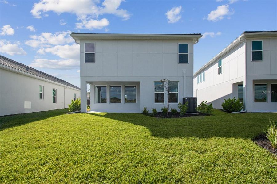 Exterior details and patio area of a home in Vistera of Venice – Garden Series, Nokomis (Image 2).