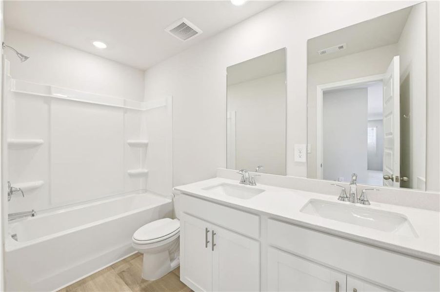 Furnished interior view inside a new home in Martin Springs - Estate Series, Lawrenceville (Image 6). Furnished interior view inside a new home in Martin Springs - Estate Series, Lawrenceville (Image 6).