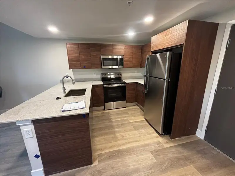 Furnished interior view inside a new home in , Orlando (Image 3).