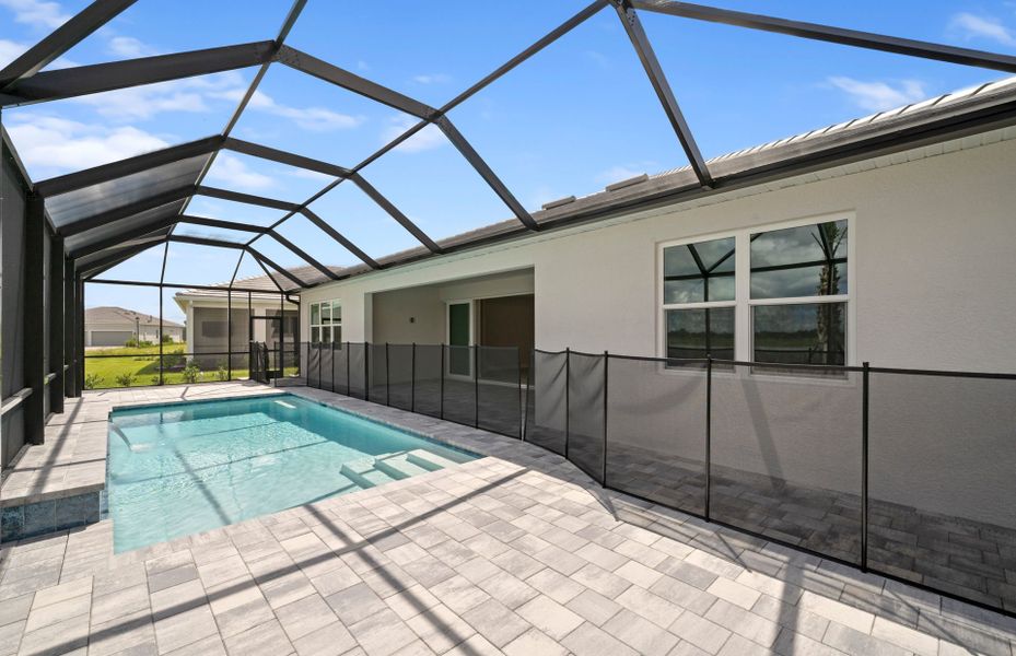 Exterior details and patio area of a home in Del Webb Oak Creek, North Fort Myers (Image 24).