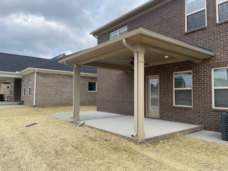 Exterior details and patio area of a home in Brandon Woods, Spring Hill (Image 3).