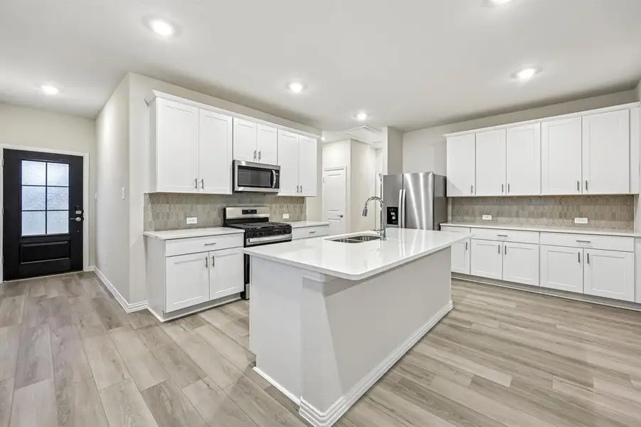 Furnished interior view inside a new home in Parks at Foster Crossing - Spring Series, Anna (Image 11).