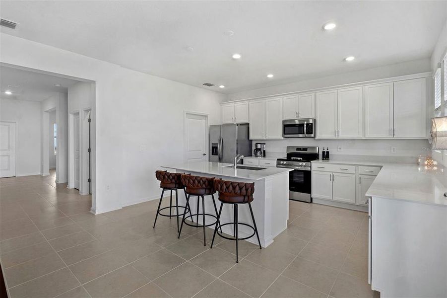 Furnished interior view inside a new home in Wellness Ridge, Clermont (Image 9).