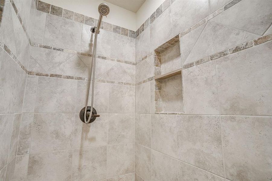 Bathroom view of a tile shower Bathroom view of a tile shower