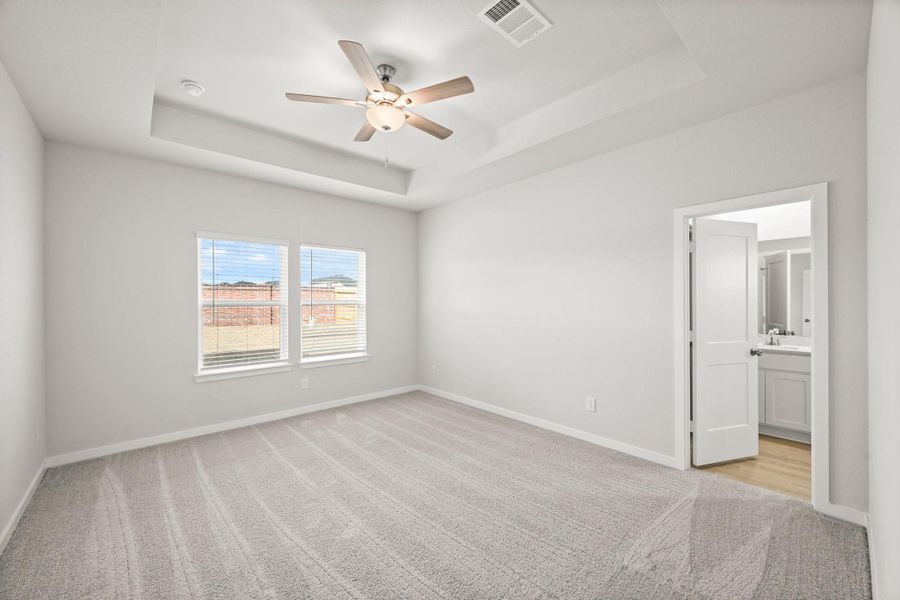 Spacious, unfurnished interior of a new home in Sunterra, Katy (Image 28).