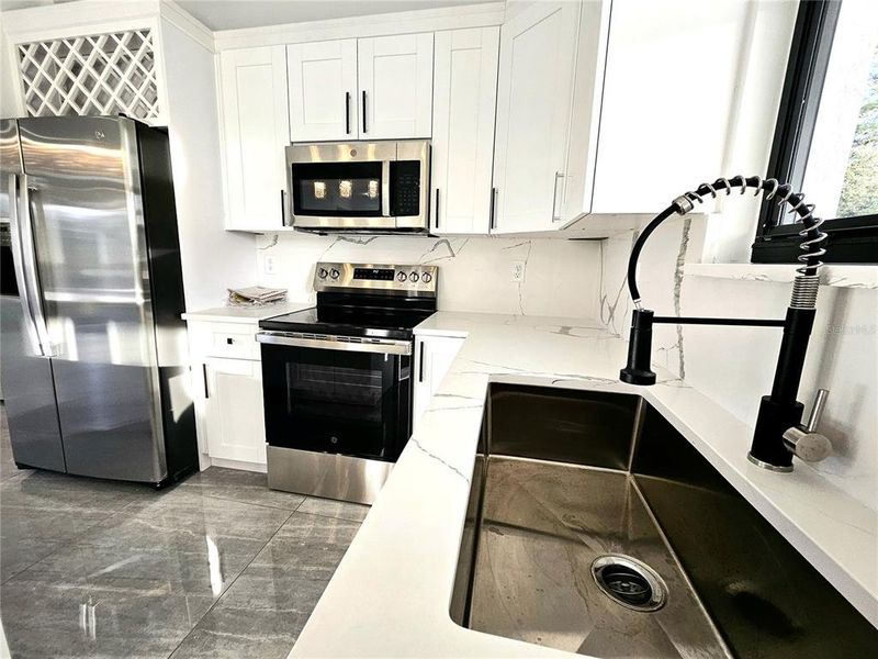 Furnished interior view inside a new home in , Lehigh Acres (Image 14).