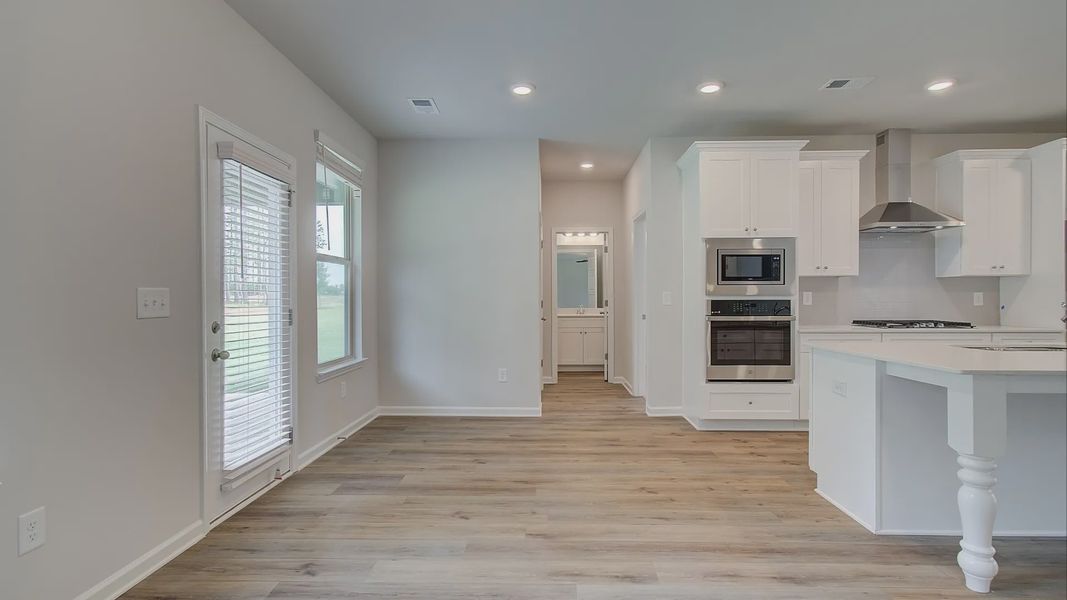 Representative furnished interior of a home built from the Meridian II by DRB Homes in Northcroft, Loganville (Image 12).