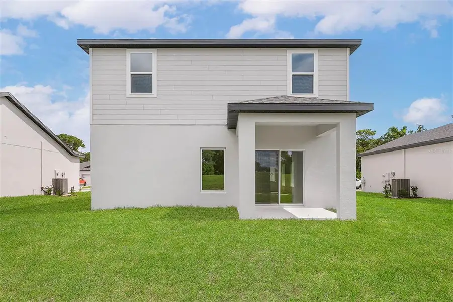 Exterior details and patio area of a home in , Astatula (Image 3).