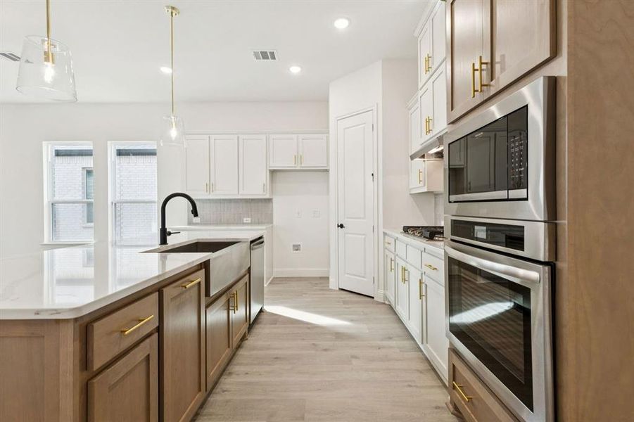 Furnished interior view inside a new home in Country Lakes, Denton (Image 7).