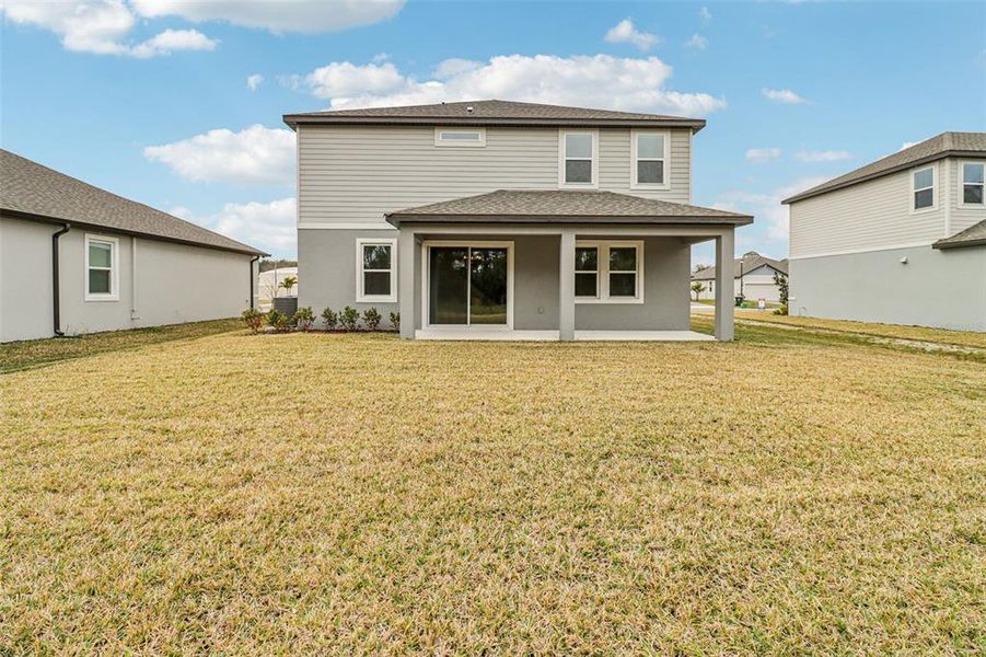 Exterior details and patio area of a home in Legends Preserve - Signature Series, Daytona Beach (Image 3).