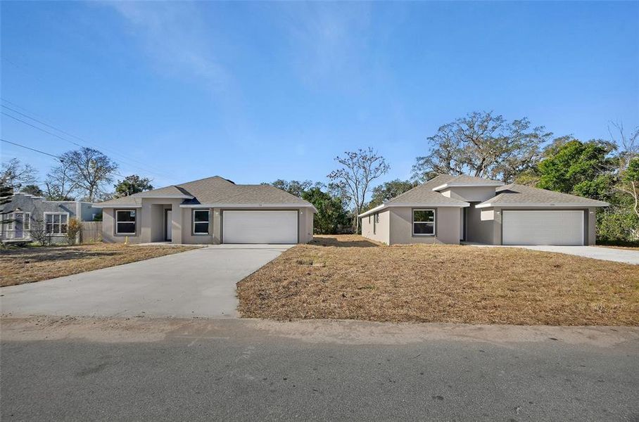 Front exterior of a new home in , Daytona Beach, FL, highlighting curb appeal (Image 17). Front exterior of a new home in , Daytona Beach, FL, highlighting curb appeal (Image 17).