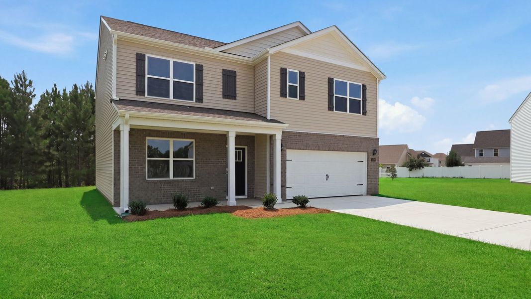 Front exterior of a new home in Villa Grande, Winterville, NC, highlighting curb appeal (Image 15).