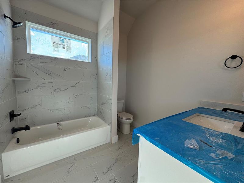 In-progress construction of a new home in Coyote Crossing, Godley, TX (Image 16).