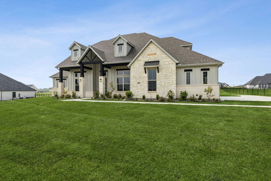 Front exterior of a new home in Berkshire Estates, Mesquite, TX, highlighting curb appeal (Image 23).