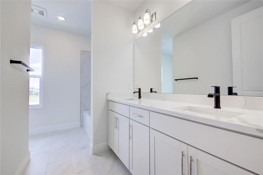 Furnished interior view inside a new home in Bungalow Walk at Lakewood Ranch, Sarasota (Image 11).