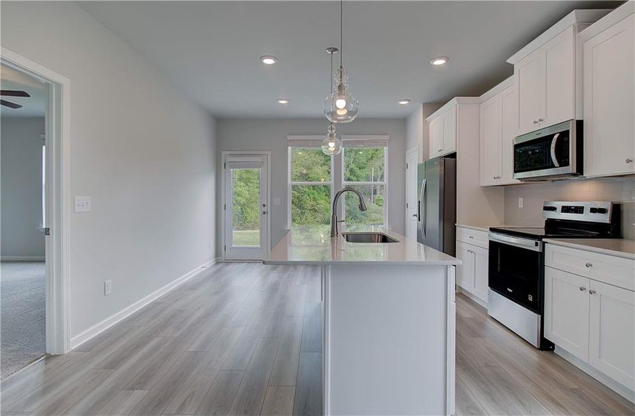 Furnished interior view inside a new home in Enclave at Evergreen, Fairburn (Image 5).
