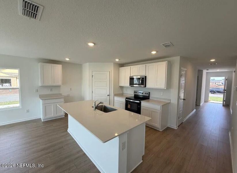 Furnished interior view inside a new home in Sawmill Branch, Palm Coast (Image 8).