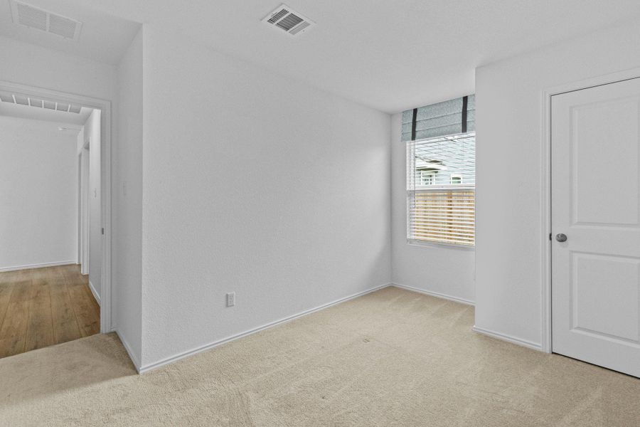 Spacious, unfurnished interior of a new home in Sunset Oaks, San Marcos (Image 22).