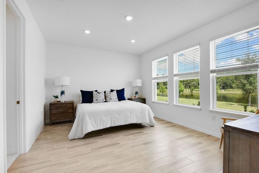 Representative furnished interior of a home built from the Saint Thomas by Taylor Morrison in Ardisia Park, New Smyrna Beach (Image 32).