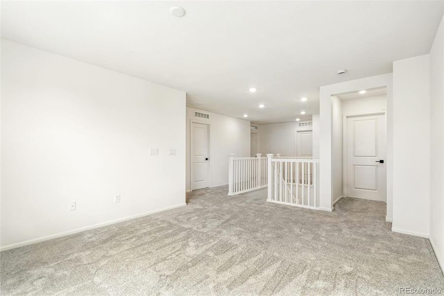 Spacious, unfurnished interior of a new home in Windsong, Thornton (Image 14).