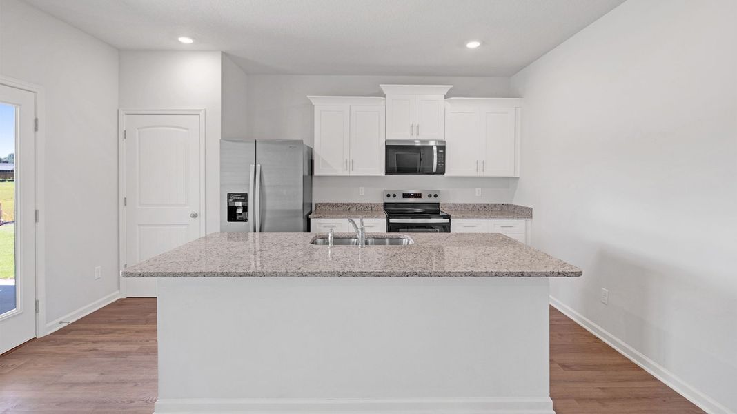 Furnished interior view inside a new home in Huntington Estates, Millington (Image 7).