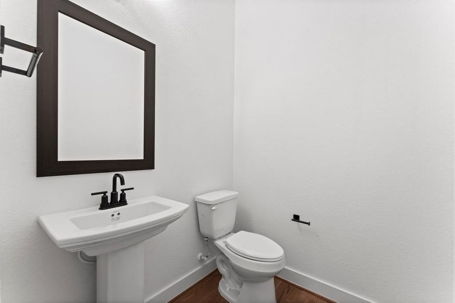 Powder Bath with Hallway to Game Room