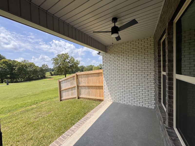 Exterior details and patio area of a home in The Greens at Legacy Townhomes, Springfield (Image 3).