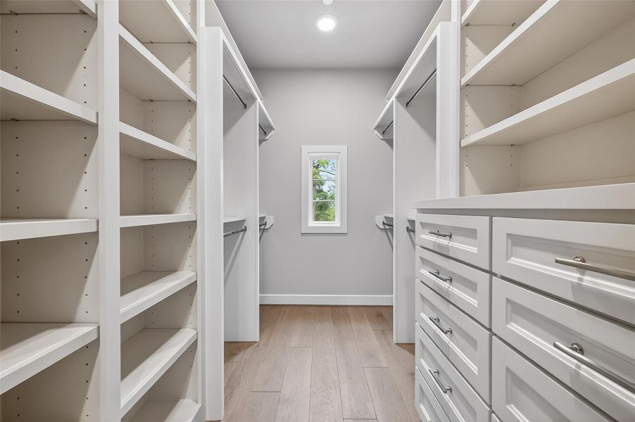 Customized closet in one of the secondary bedrooms. Customized closet in one of the secondary bedrooms.