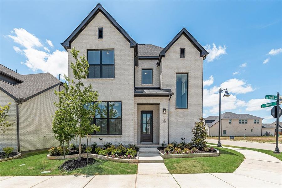 Front exterior of a new home in Cottages of Celina, Celina, TX, highlighting curb appeal (Image 23).