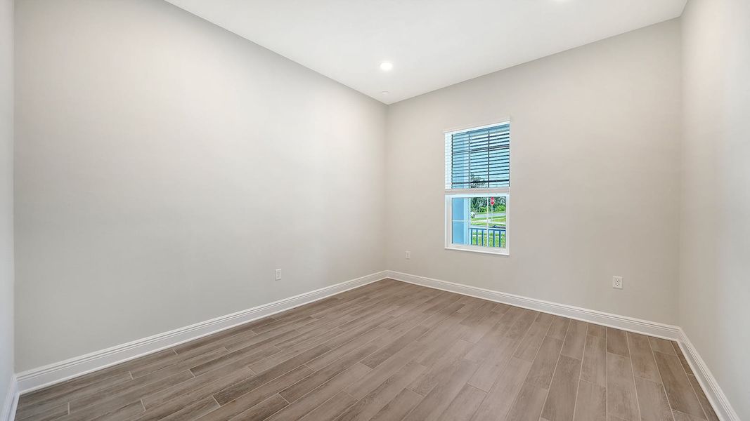 Spacious, unfurnished interior of a new home in Canoe Creek Real Estate and Homes for Sale in Parrish, FL - Neal Communities, Parrish (Image 45).